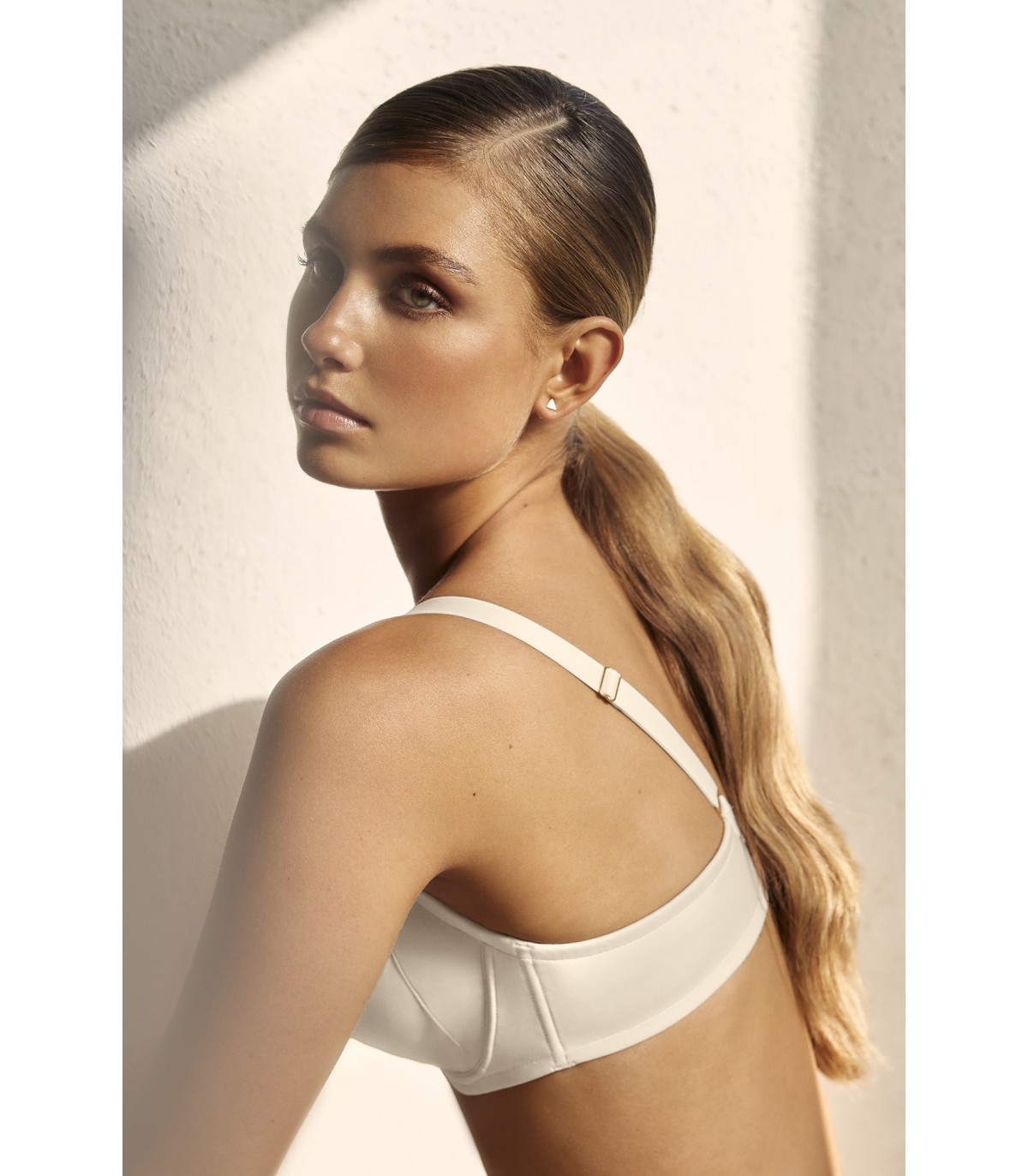 SUJETADOR DE CAPACIDAD